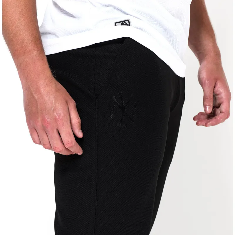 hosen-lange-hose-schwarz-jogger-stealth-der-new-york-yankees-mlb-von-new-era hosen-lange-hose-schwarz-jogger-stealth-der-new-york-yankees-mlb-von-new-era