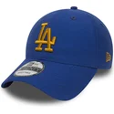 verstellbare-blaue-kappe-mit-gebogenem-schirm-und-goldenem-logo-9twenty-nylon-packable-los-angeles-dodgers-mlb-von-new-era