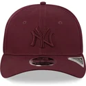 mutzen-gebogen-rot-snapback-granate-granate-9fifty-stretch-snap-der-new-york-yankees-mlb-von-new-era