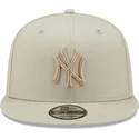 graue-snapback-kappe-mit-flachem-schirm-und-grauem-logo-9fifty-league-essential-der-new-york-yankees-mlb-von-new-era