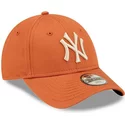 new-era-curved-brim-youth-9forty-league-essential-new-york-yankees-mlb-orange-adjustable-cap-with-beige-logo
