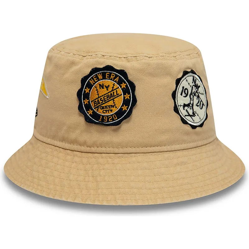 eimer-beige-der-bucket-beige-buffalo-new-york-all-over-patch-von-new-era eimer-beige-der-bucket-beige-buffalo-new-york-all-over-patch-von-new-era