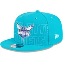 mutzen-flach-blau-snapback-9fifty-draft-edition-2023-der-charlotte-hornets-nba-von-new-era
