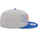 gorra-plana-gris-y-azul-snapback-9fifty-draft-edition-2023-de-new-york-knicks-nba-de-new-era