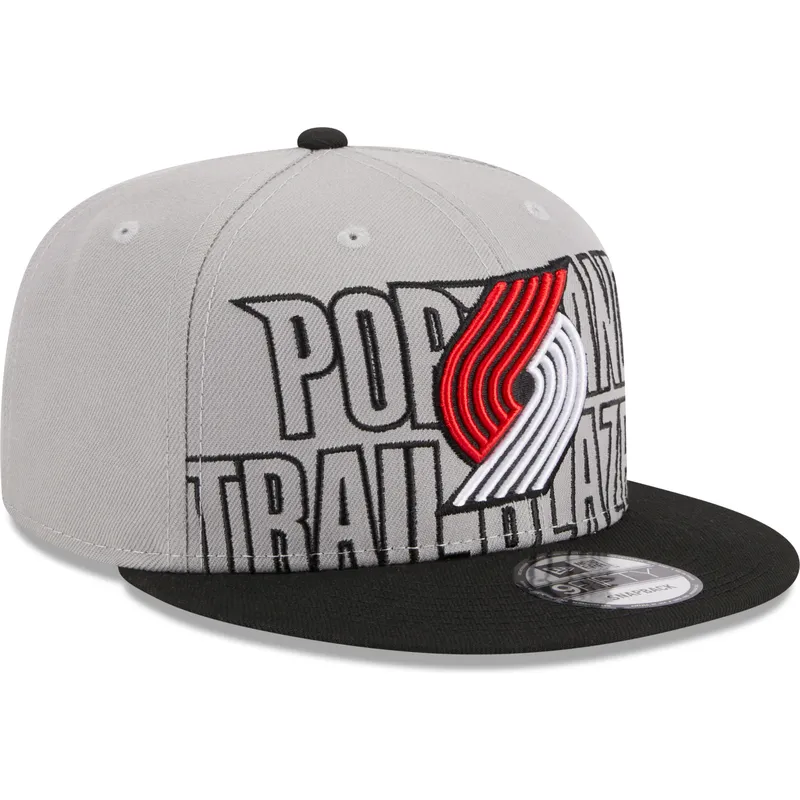 graue-und-schwarze-flache-snapback-kappe-9fifty-draft-edition-2023-von-portland-trail-blazers-nba-von-new-era