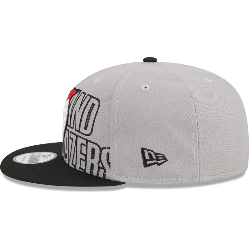 graue-und-schwarze-flache-snapback-kappe-9fifty-draft-edition-2023-von-portland-trail-blazers-nba-von-new-era