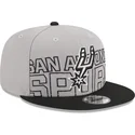 casquette-plate-grise-et-noire-snapback-9fifty-draft-edition-2023-san-antonio-spurs-nba-new-era