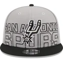 casquette-plate-grise-et-noire-snapback-9fifty-draft-edition-2023-san-antonio-spurs-nba-new-era