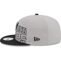 casquette-plate-grise-et-noire-snapback-9fifty-draft-edition-2023-san-antonio-spurs-nba-new-era