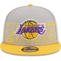 graue-und-gelbe-snapback-kappe-9fifty-draft-edition-2023-der-los-angeles-lakers-nba-von-new-era