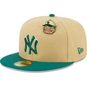 flache-beige-und-grune-anliegende-kappe-59fifty-the-elements-earth-pin-der-new-york-yankees-mlb-von-new-era
