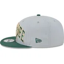 mutzen-flach-grau-snapback-9fifty-tip-off-2023-der-milwaukee-bucks-nba-von-new-era
