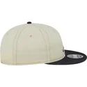 cappellino-piatto-beige-e-blu-navy-9fifty-retro-crown-denim-degli-atlanta-braves-mlb-di-new-era