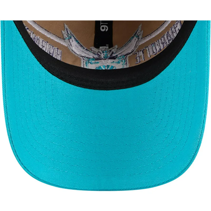 braune-und-blaue-verstellbare-curved-cap-9twenty-draft-2024-der-charlotte-hornets-nba-von-new-era