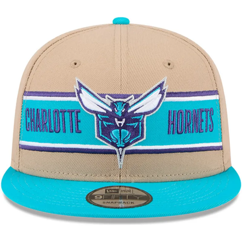 braune-und-blaue-flatcap-snapback-9fifty-draft-2024-der-charlotte-hornets-nba-von-new-era