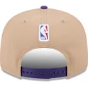 braune-und-violette-flatcap-snapback-9fifty-draft-2024-der-los-angeles-lakers-nba-von-new-era