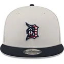 cappellino-piatto-beige-e-blu-navy-snapback-9fifty-4th-of-july-dei-detroit-tigers-mlb-di-new-era