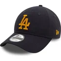 marineblaue-verstellbare-curved-cap-mit-gelbem-logo-9twenty-league-essential-der-los-angeles-dodgers-mlb-von-new-era