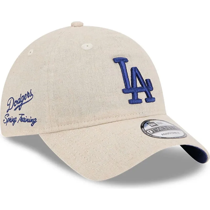 beige-verstellbare-curved-cap-mit-blauem-logo-9twenty-linen-spring-training-fan-pack-2025-der-los-angeles-dodgers-mlb-von-new-er