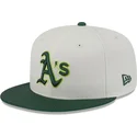 beige-und-grune-anliegende-flat-cap-59fifty-clr-dvlp-der-oakland-athletics-mlb-von-new-era