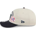 beige-und-marineblaue-gebogene-snapback-kappe-9fifty-retro-crown-scatter-der-new-york-yankees-mlb-von-new-era