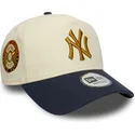 bezowo-granatowa-czapka-z-zakrzywionym-daszkiem-snapback-9forty-e-frame-z-naszywka-world-series-new-york-yankees-mlb-od-new-era