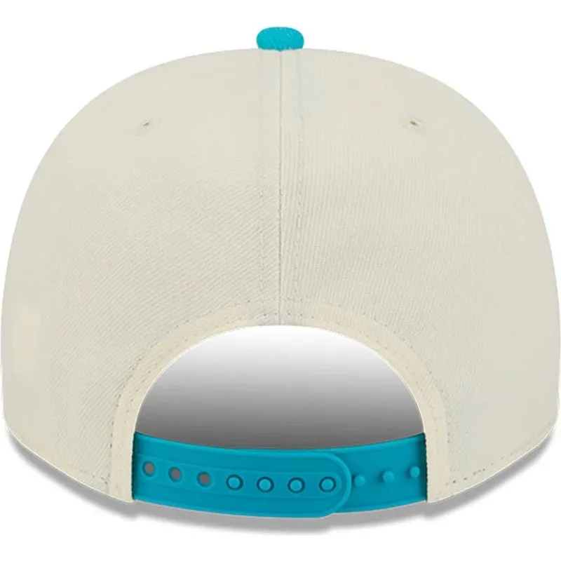 gorra-curva-beige-y-azul-snapback-9fifty-a-frame-precurved-hardwood-classics-de-charlotte-hornets-nba-de-new-era