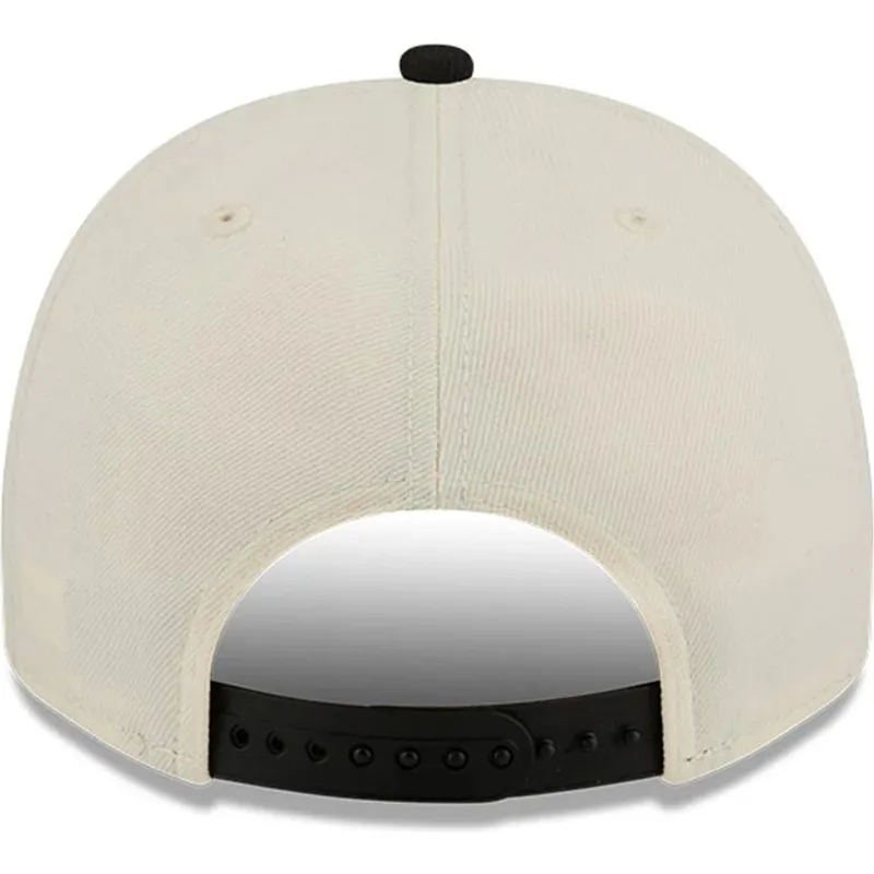 beige-und-schwarze-gebogene-snapback-kappe-9fifty-a-frame-precurved-hardwood-classics-von-orlando-magic-nba-von-new-era