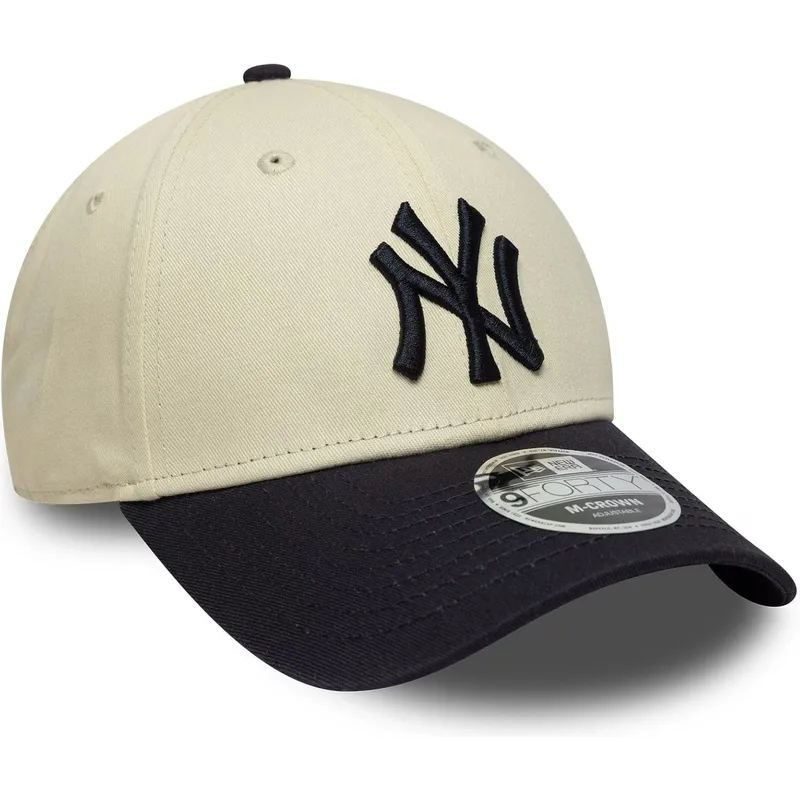 beige-und-marineblaue-gebogene-snapback-kappe-9forty-m-crown-der-new-york-yankees-mlb-von-new-era