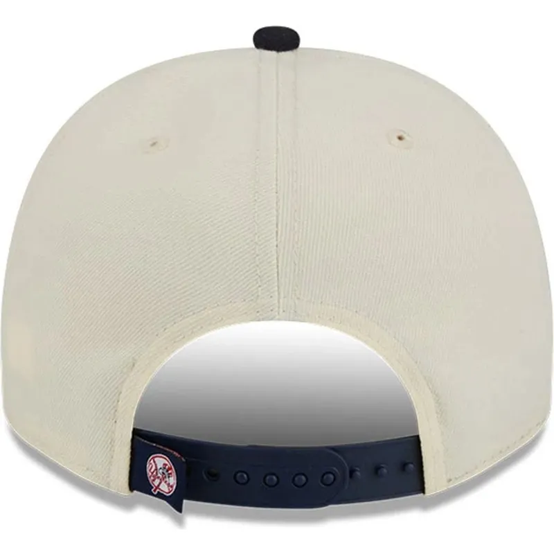 gorra-curva-beige-y-azul-marino-snapback-9fifty-a-frame-classic-de-new-york-yankees-mlb-de-new-era