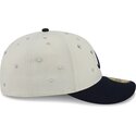 casquette-courbee-beige-et-bleue-marine-ajustee-59fifty-beads-na-lifestyle-f1-atlanta-braves-mlb-new-era