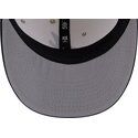 casquette-courbee-beige-et-bleue-marine-ajustee-59fifty-beads-na-lifestyle-f1-atlanta-braves-mlb-new-era